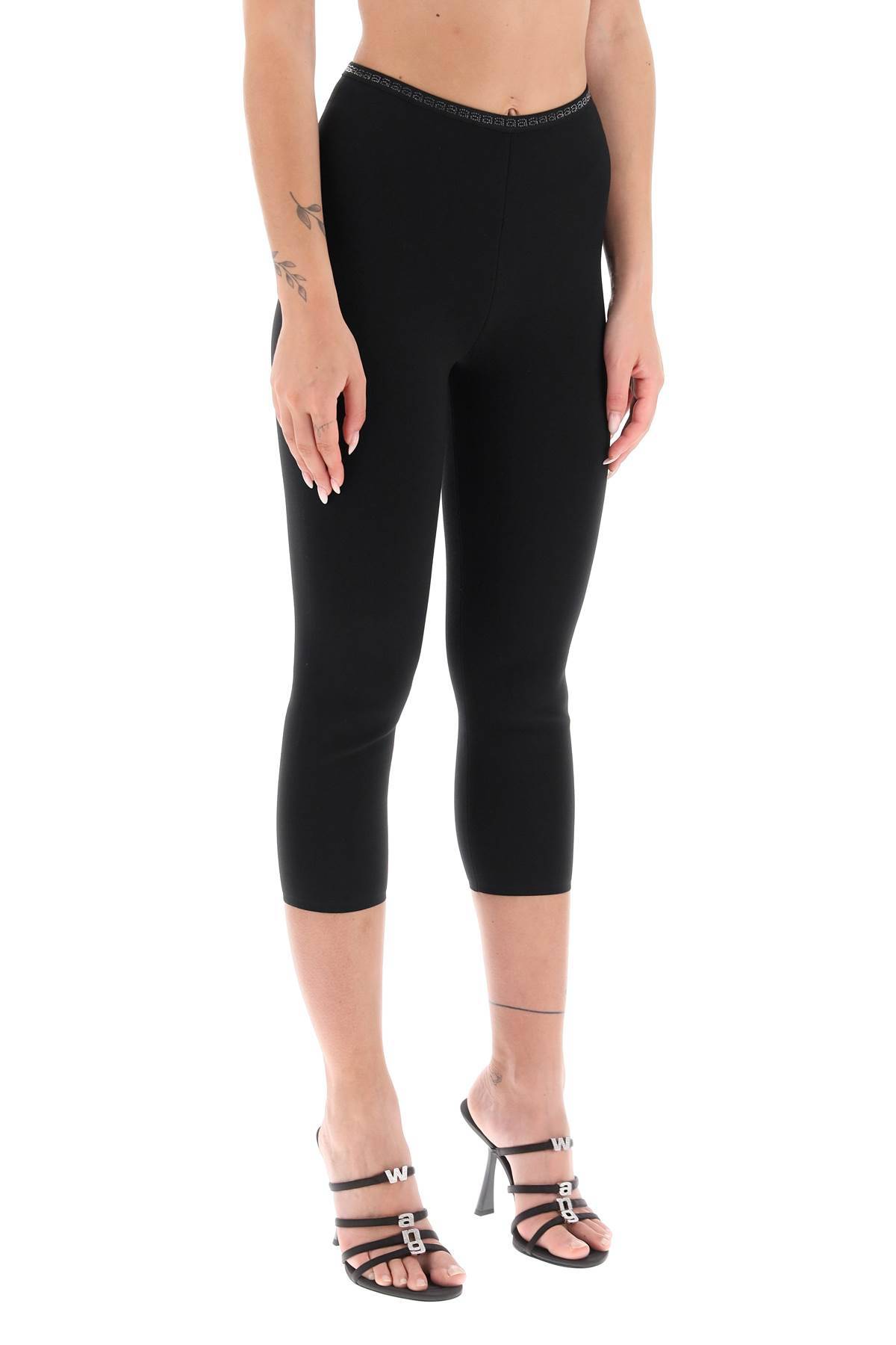 Shop Alexander Wang Cropped Leggings With Crystal-studded Logoed Band In Black