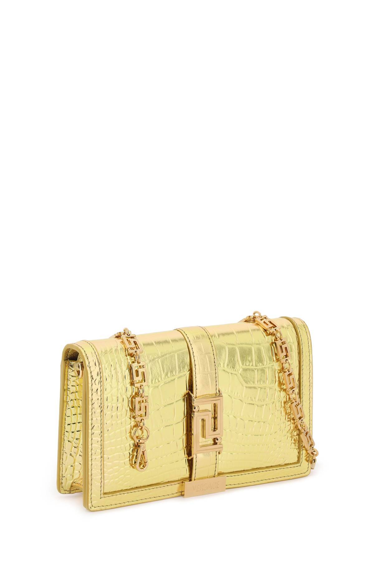 Shop Versace Croco-embossed Leather Greca Goddes Crossbody Bag In Gold