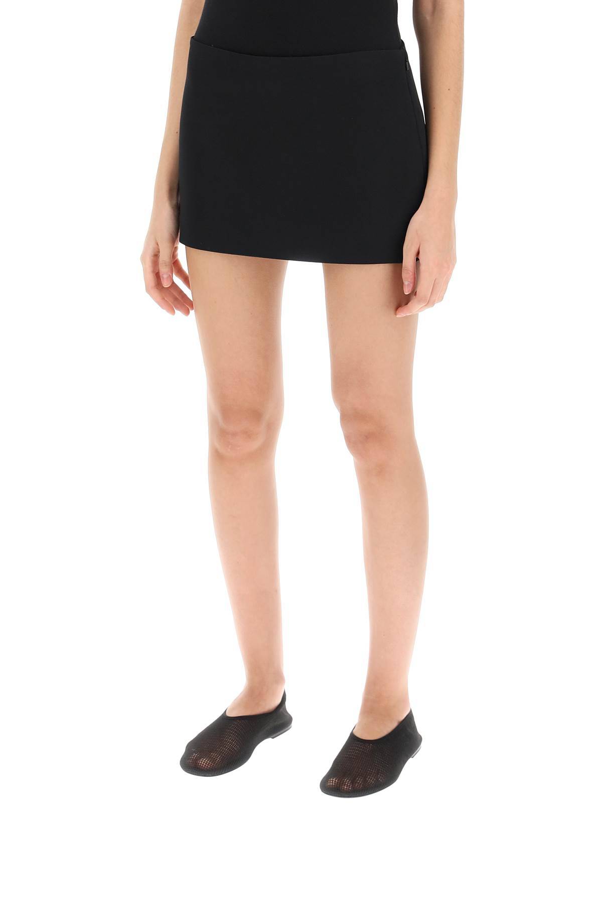 Shop Khaite Jett Low-rise Mini Skirt In Black