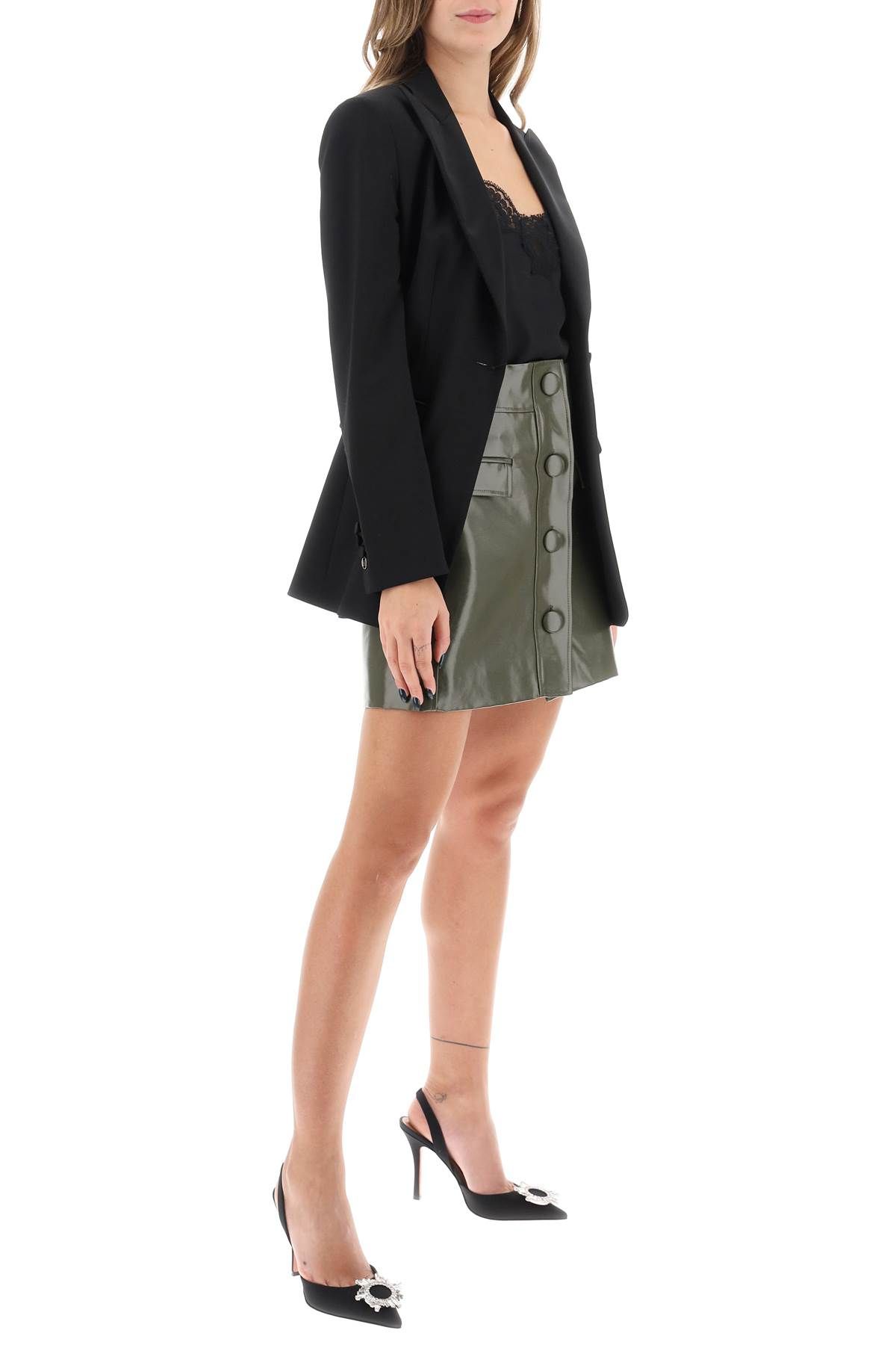 Shop Mvp Wardrobe Montenapoleone Mini Skirt In Coated Cotton In Green