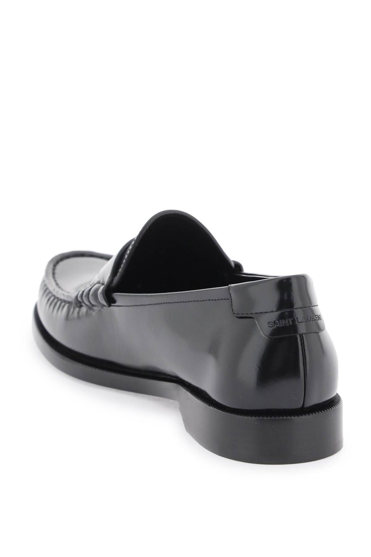 Shop Saint Laurent Leather Mocassins With Monogram In Black