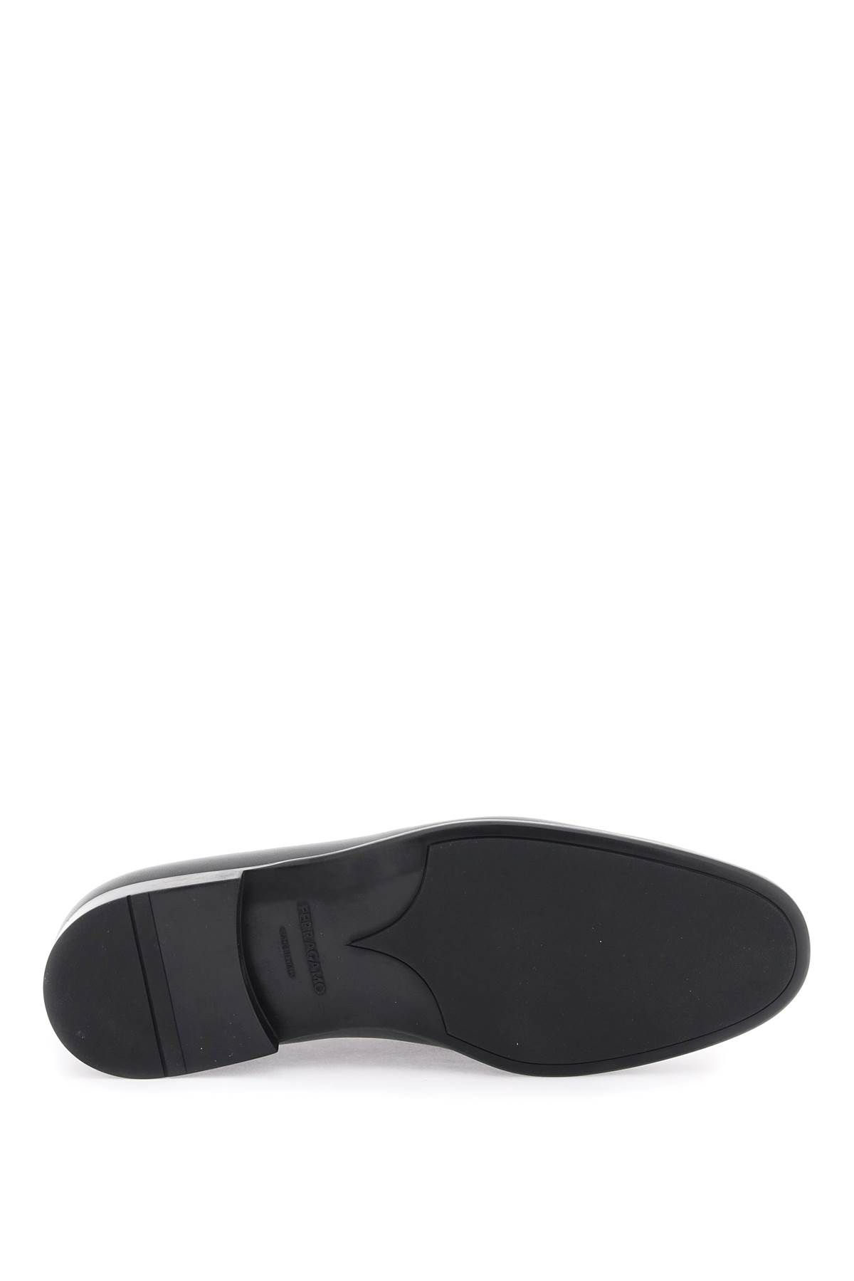 Shop Ferragamo Penny Loafers In Black