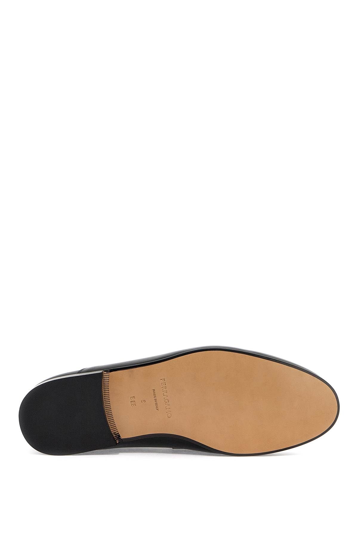 Shop Ferragamo Gancini Loafers In Black