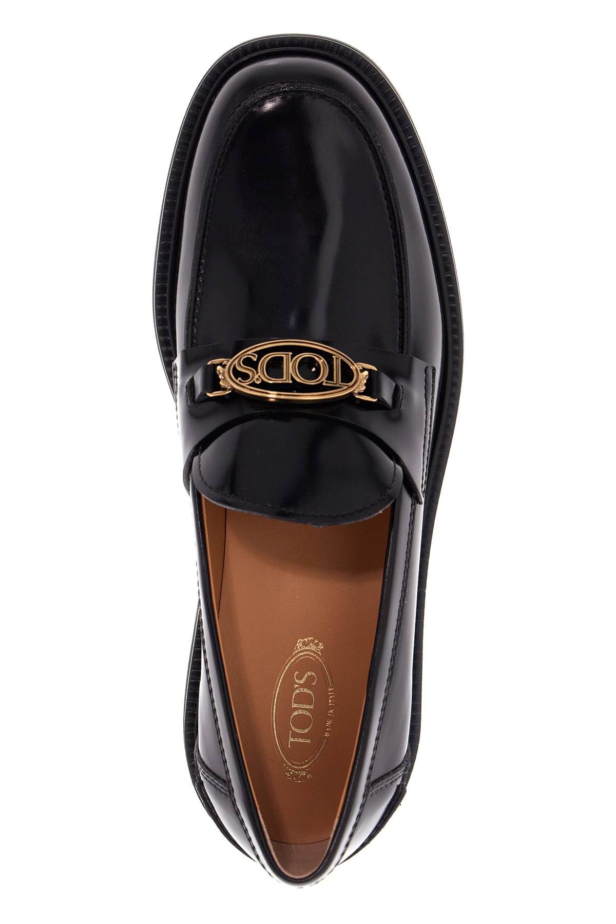 Shop Tod's Metal Logo Loafers With Metal Detailing In Black