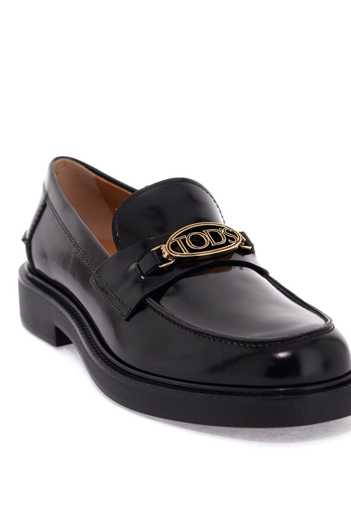 Shop Tod's Metal Logo Loafers With Metal Detailing In Black