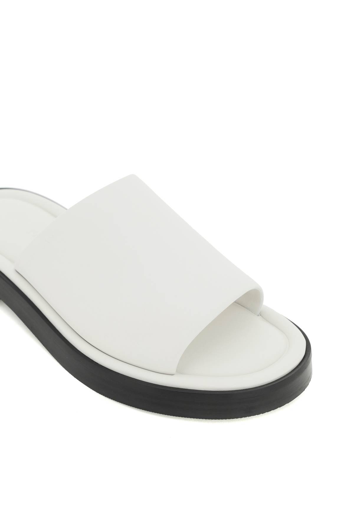 Shop Ferragamo Leather Slides In White