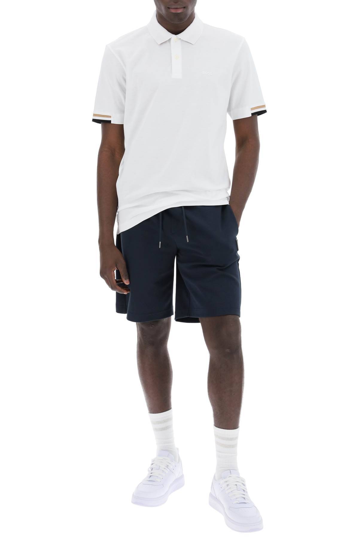 Shop Hugo Boss Parlay Polo Shirt With Stripe Detail In White