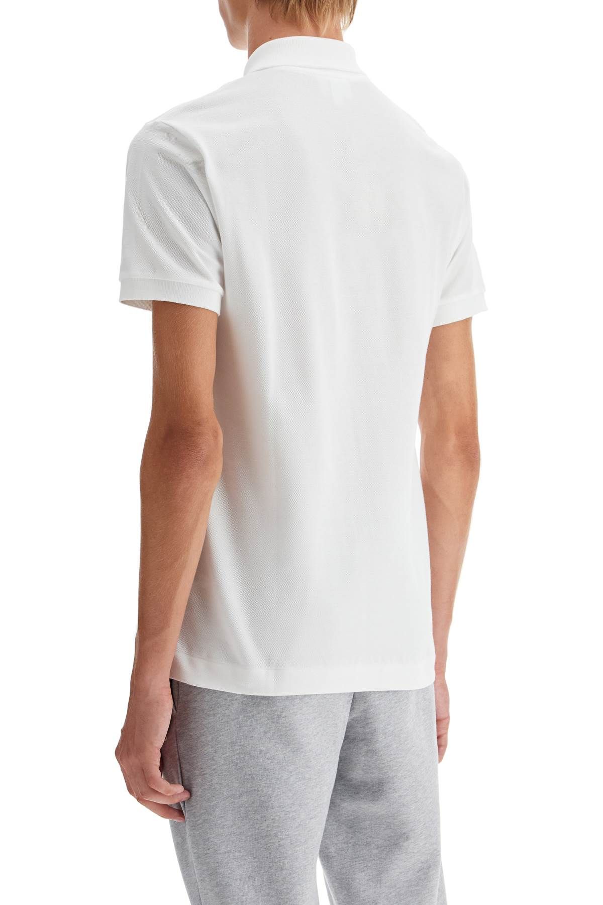 Shop Lacoste Cotton Piquet Polo In White