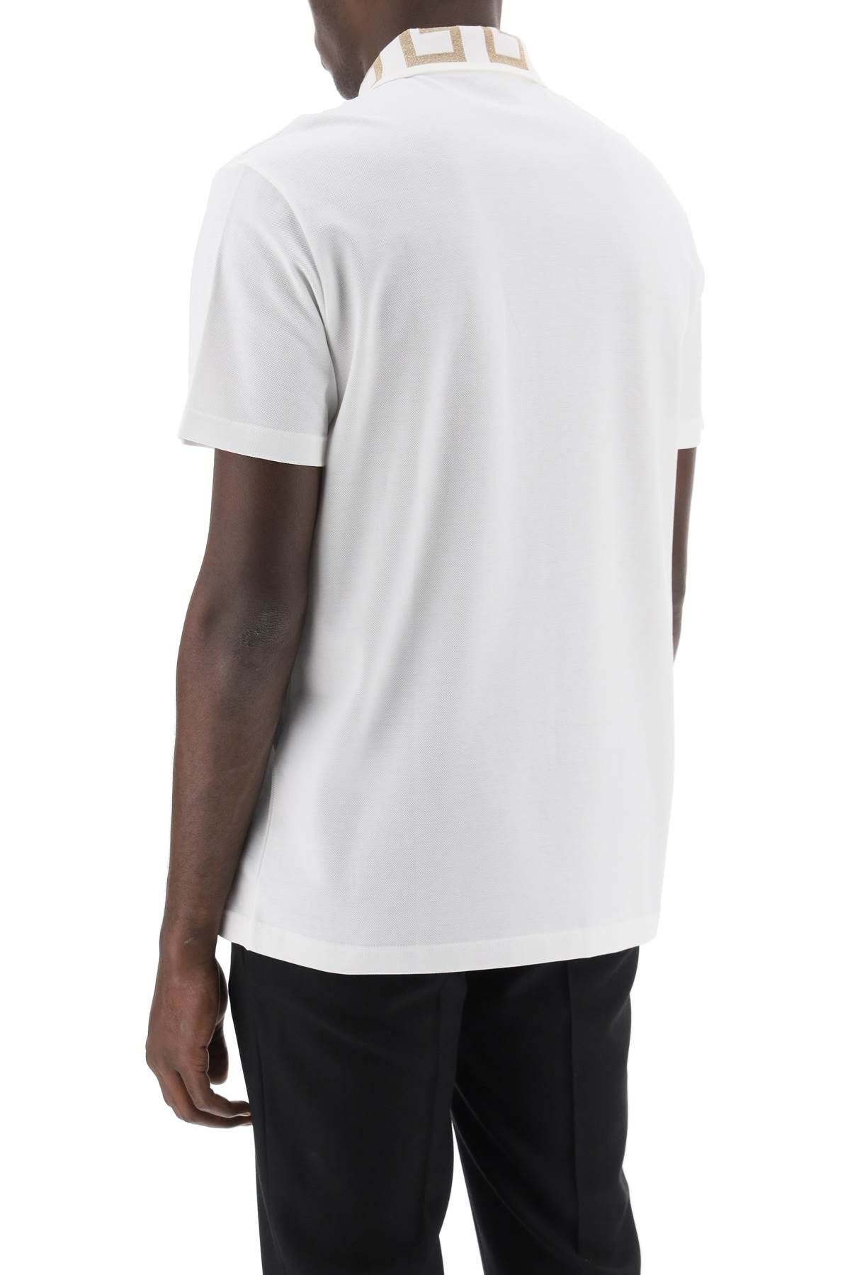 Shop Versace Polo Shirt With Greca Collar In White