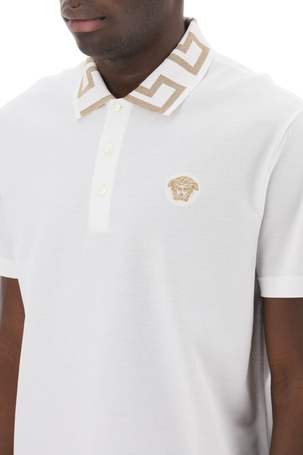 Shop Versace Polo Shirt With Greca Collar In White