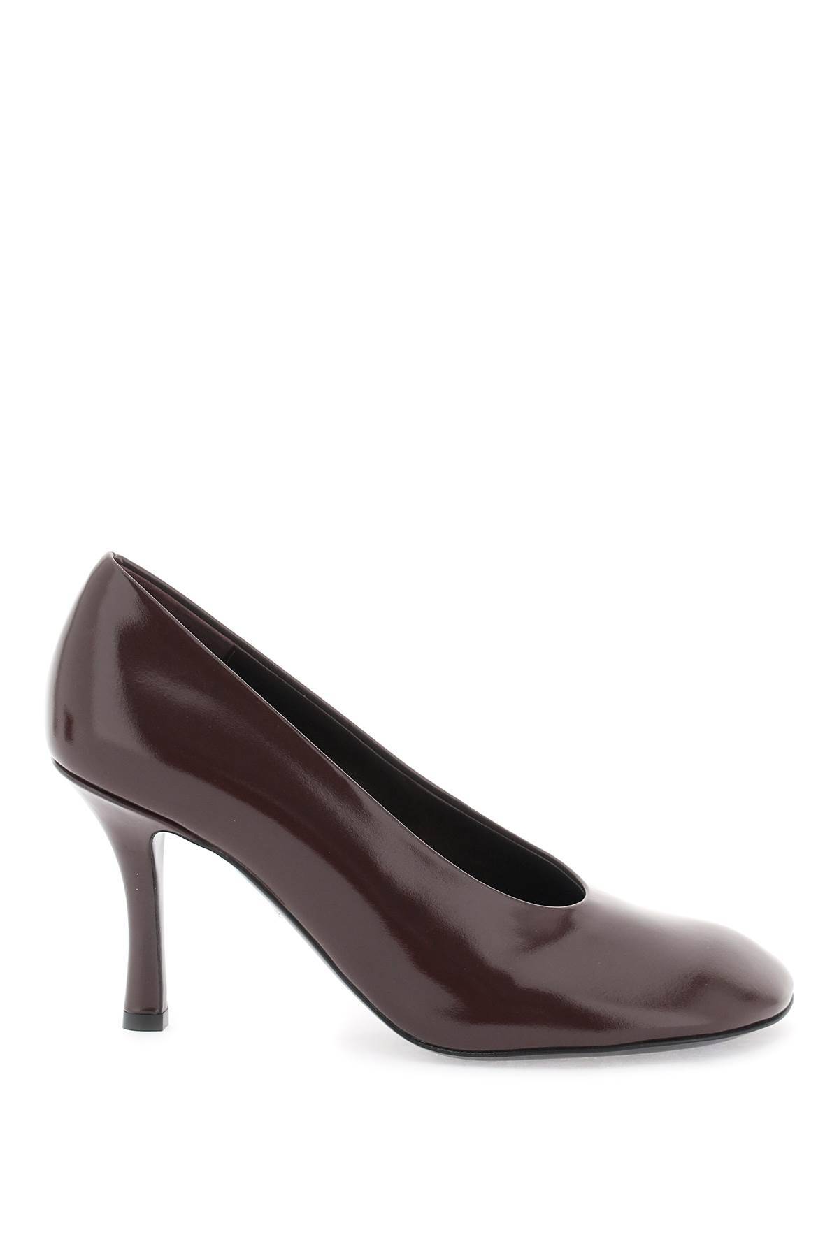 Shop Burberry Glossy Leather Baby Pumps In Black