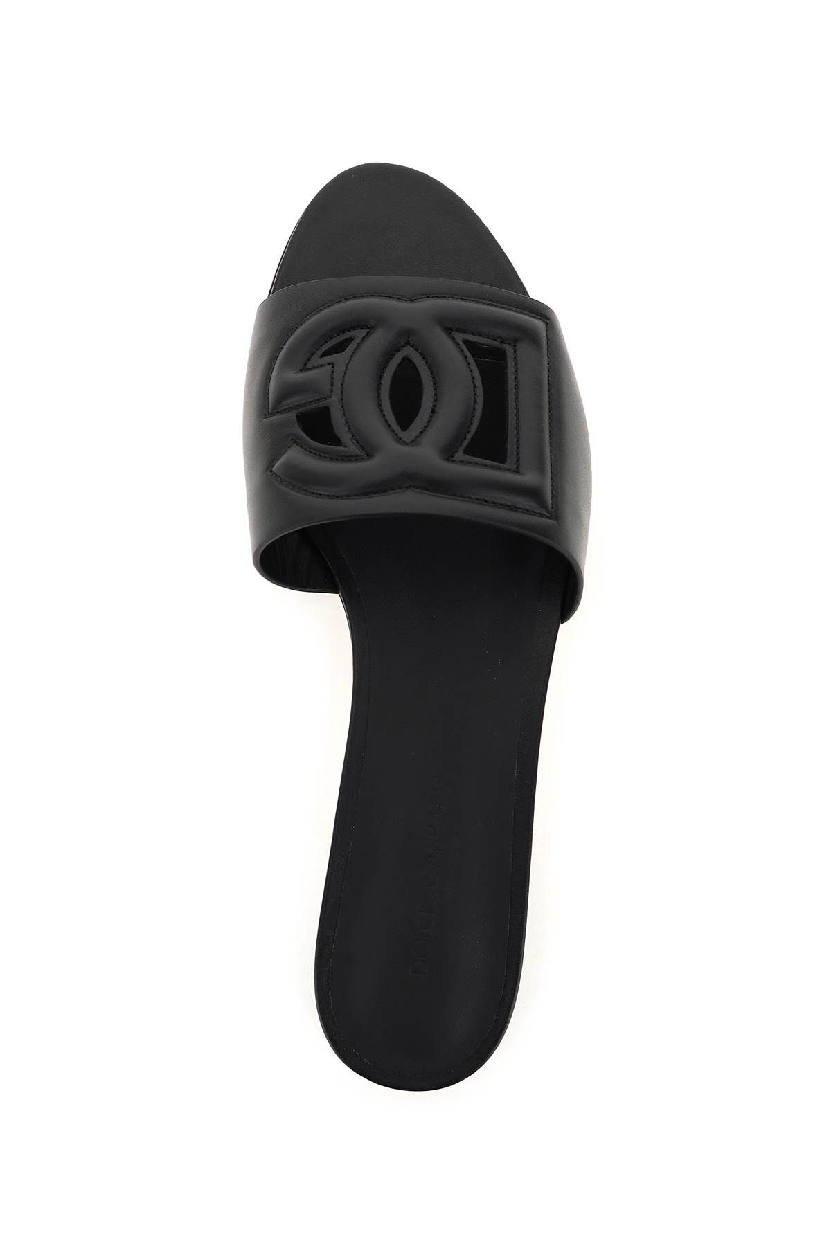 Shop Dolce & Gabbana Leather Slides With Cut-out Logo In Black