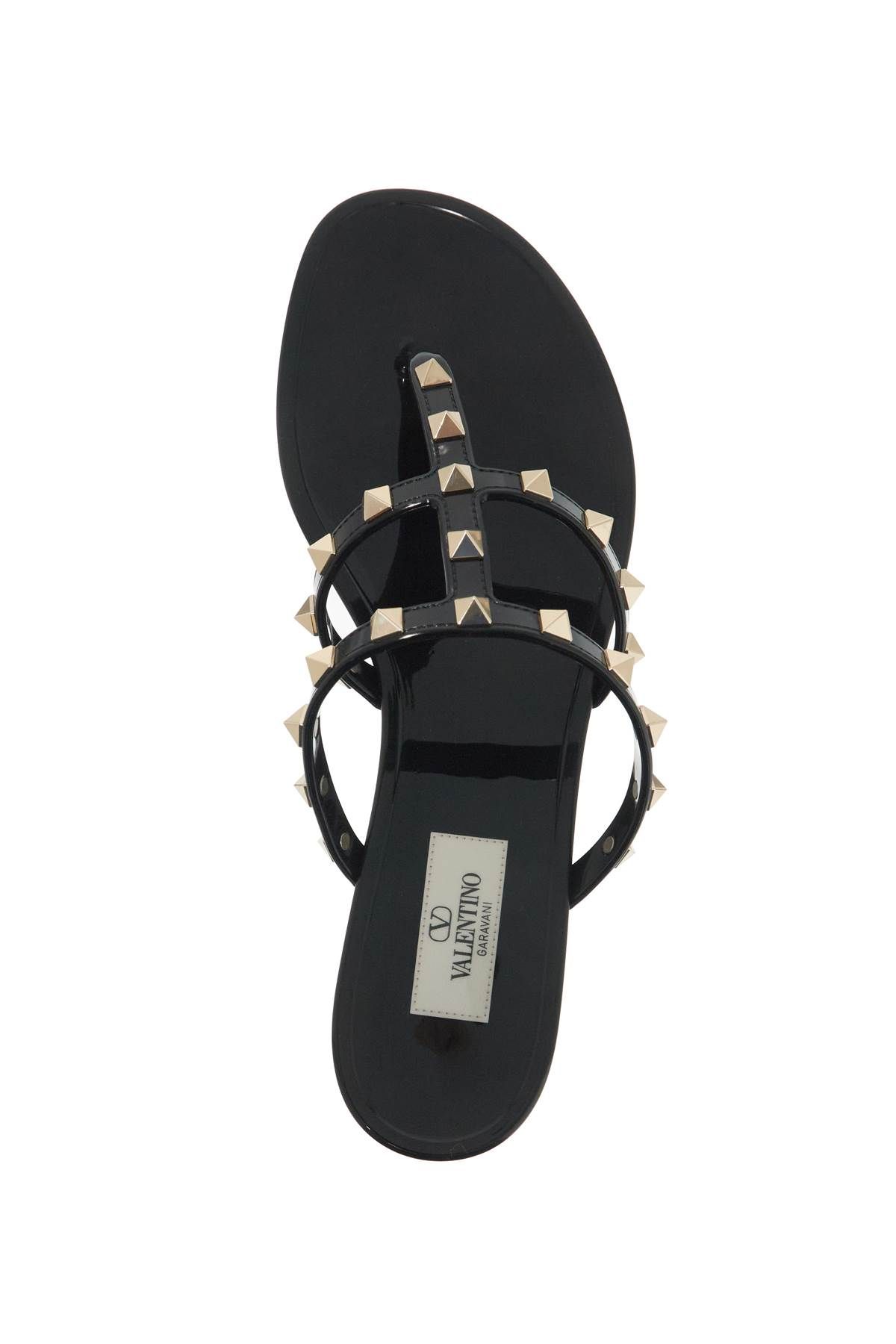 Shop Valentino Rockstud Pvc Thong Sandals In Black