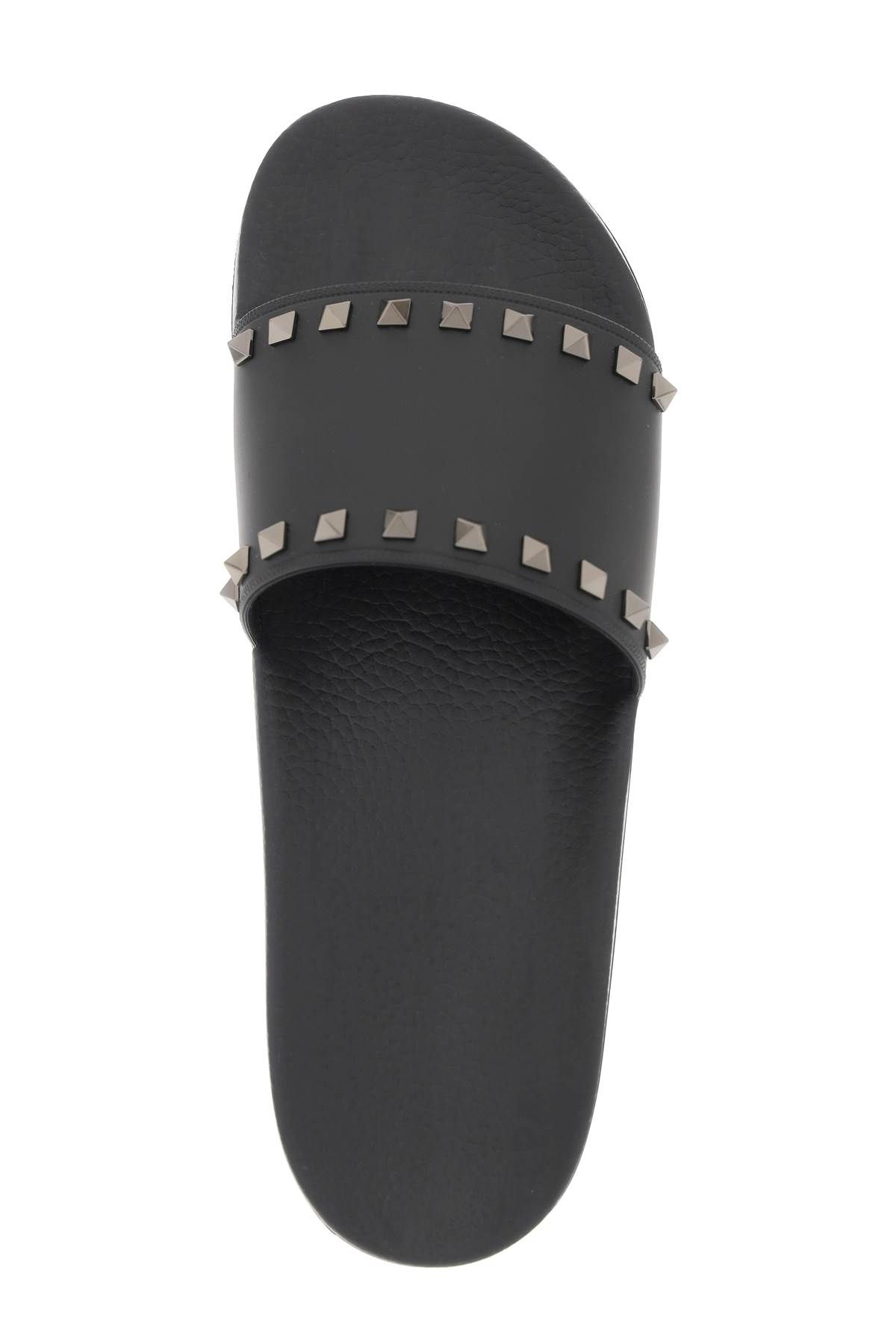 Shop Valentino Rockstud Slides In Black