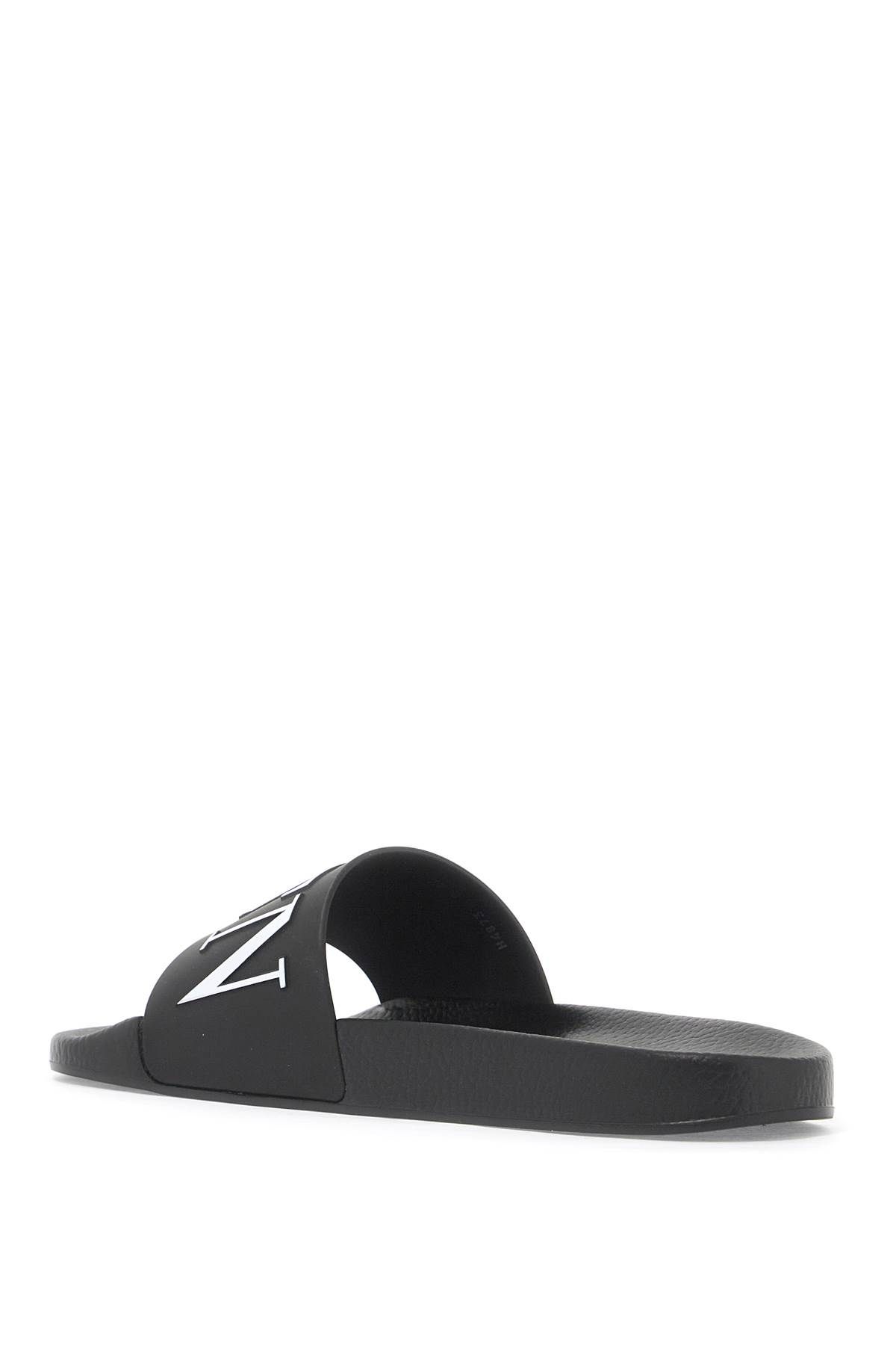 Shop Valentino Vltn Rubber Slides In Black