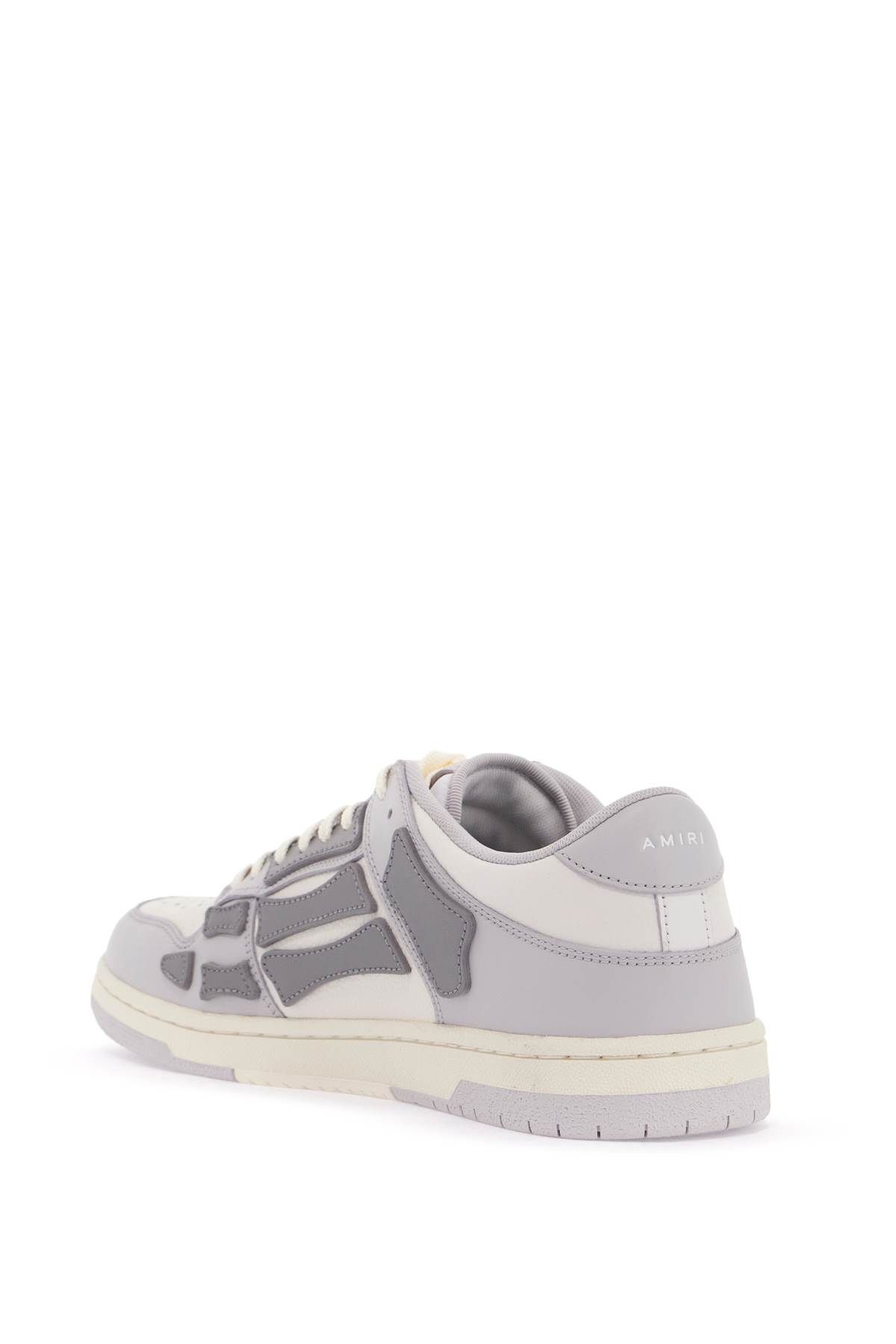 Shop Amiri Skel Top Low Sneakers In White