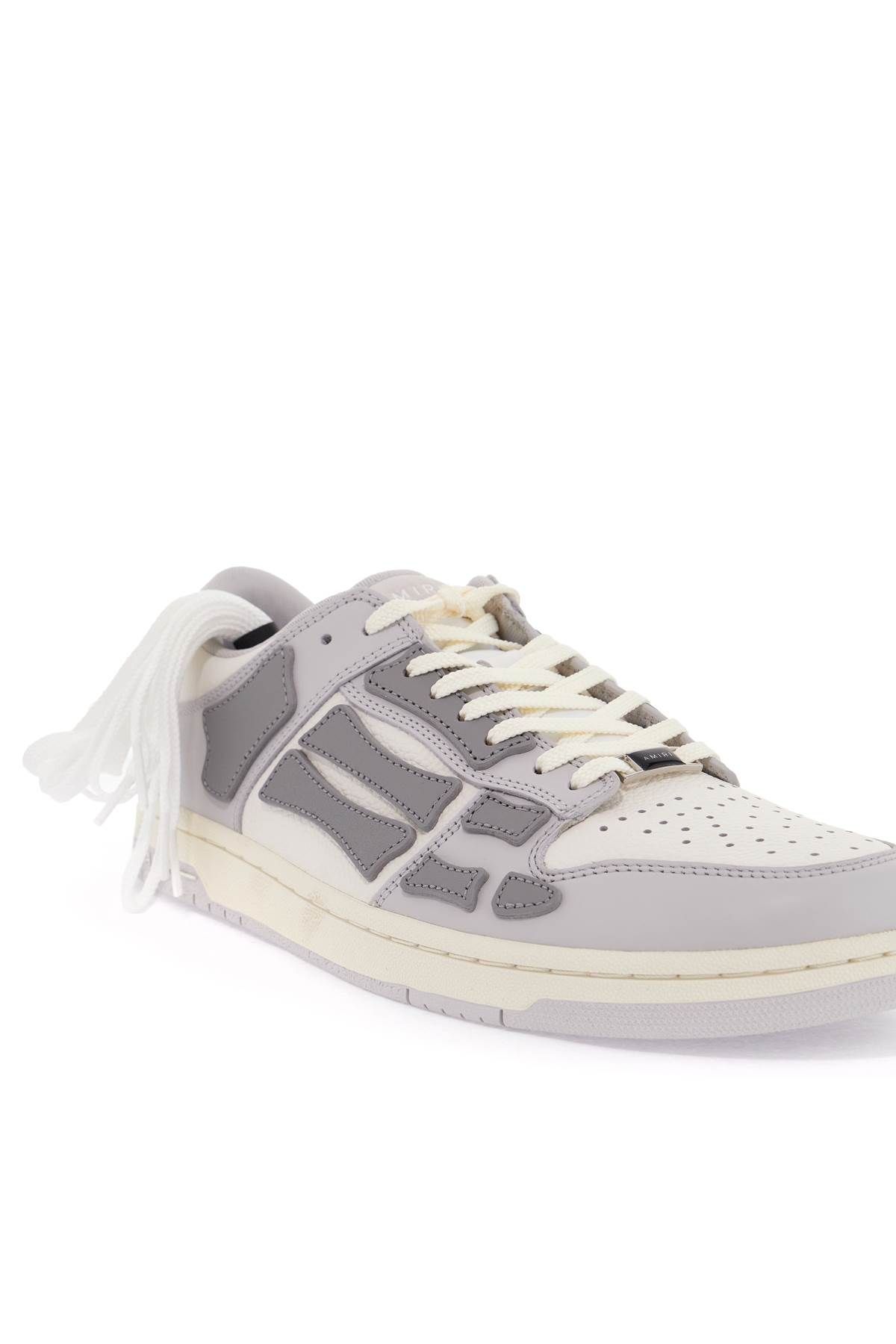 Shop Amiri Skel Top Low Sneakers In White