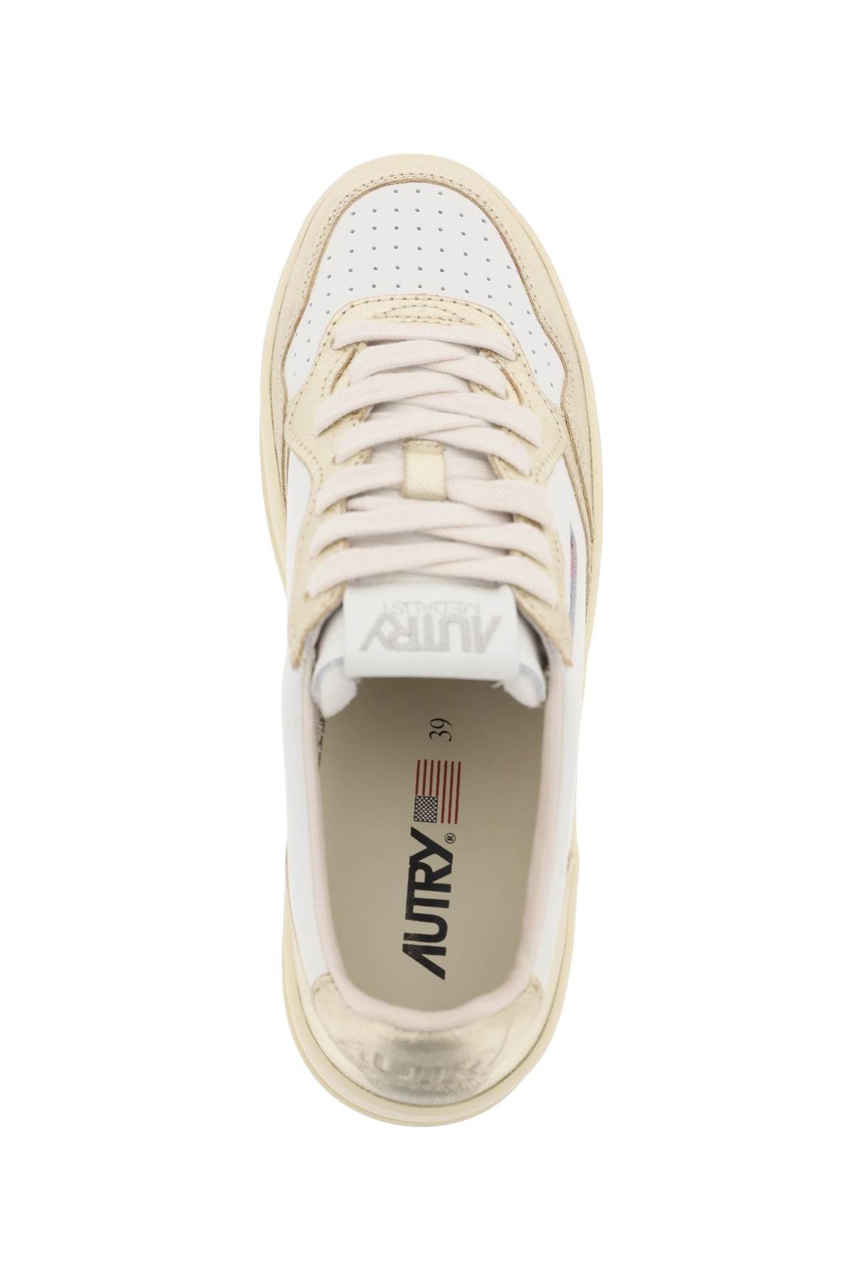 Shop Autry Medalist Low Sneakers In White,gold