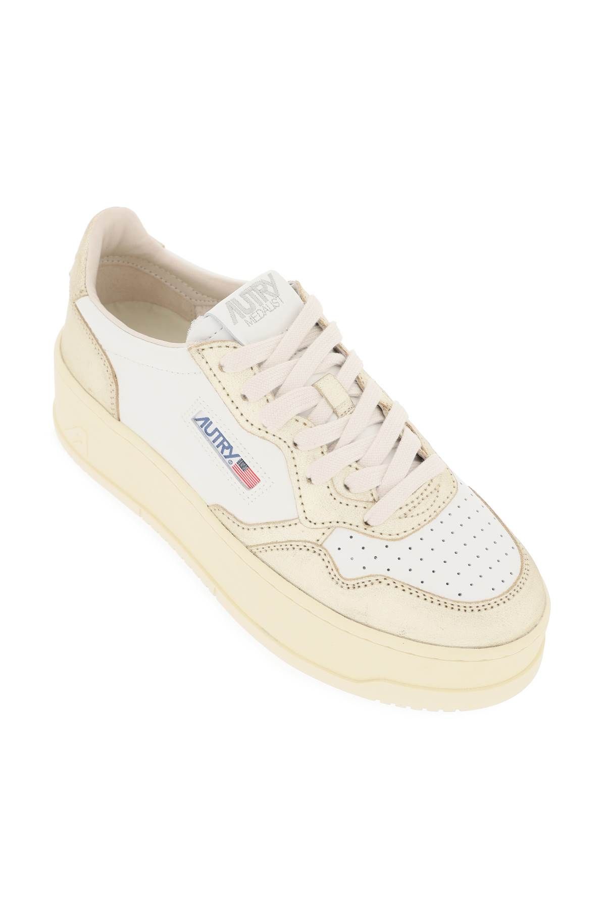 Shop Autry Medalist Low Sneakers In White,gold