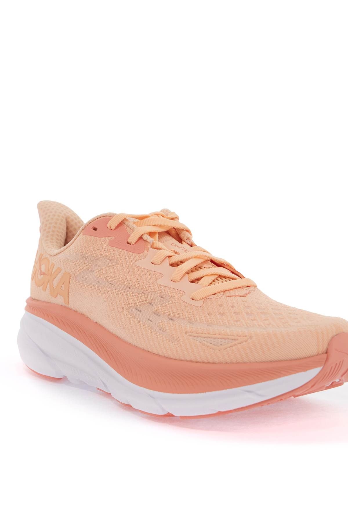 Shop Hoka Clifton 9 Sneakers In Orange