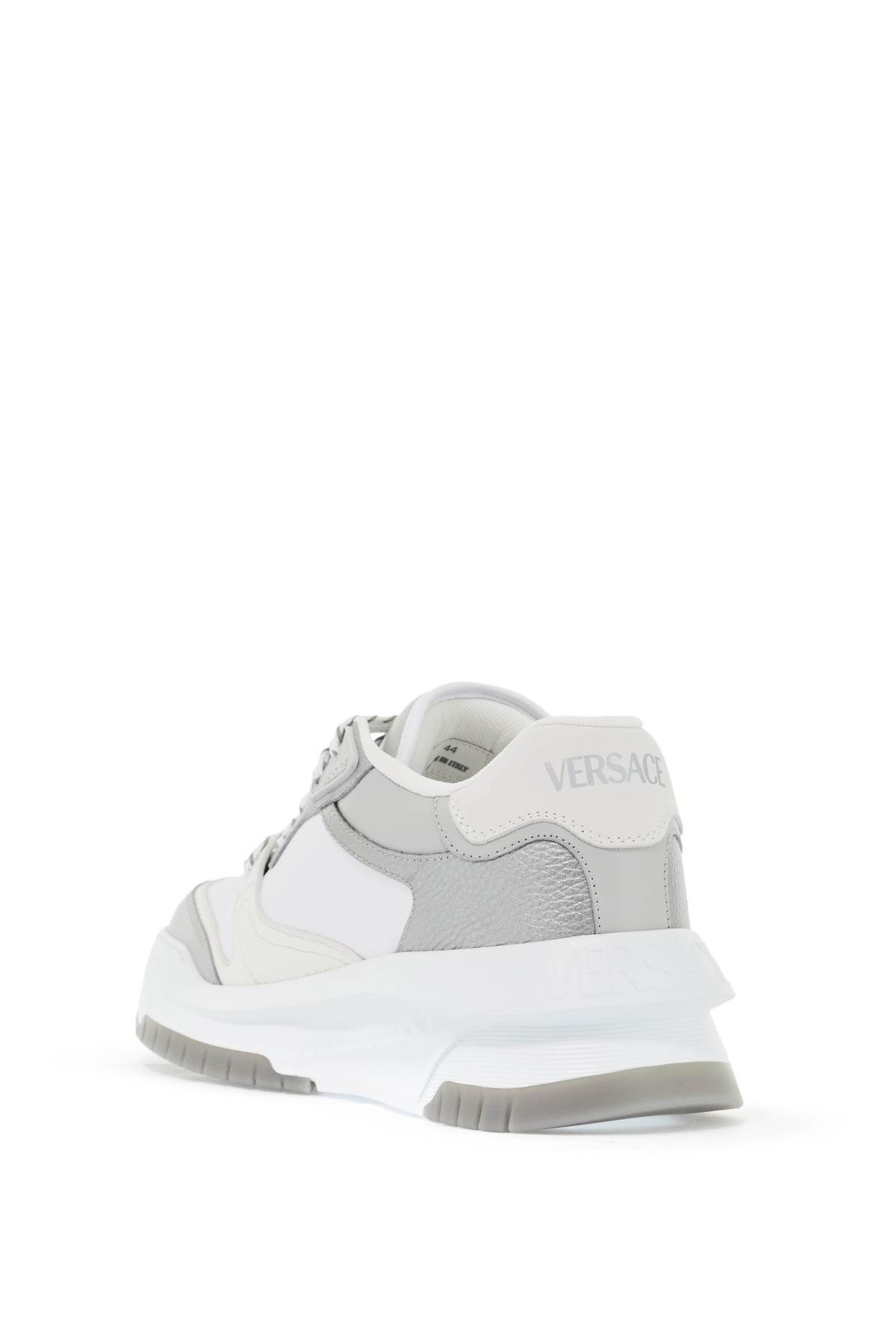 Shop Versace Odyssey Sneakers In White