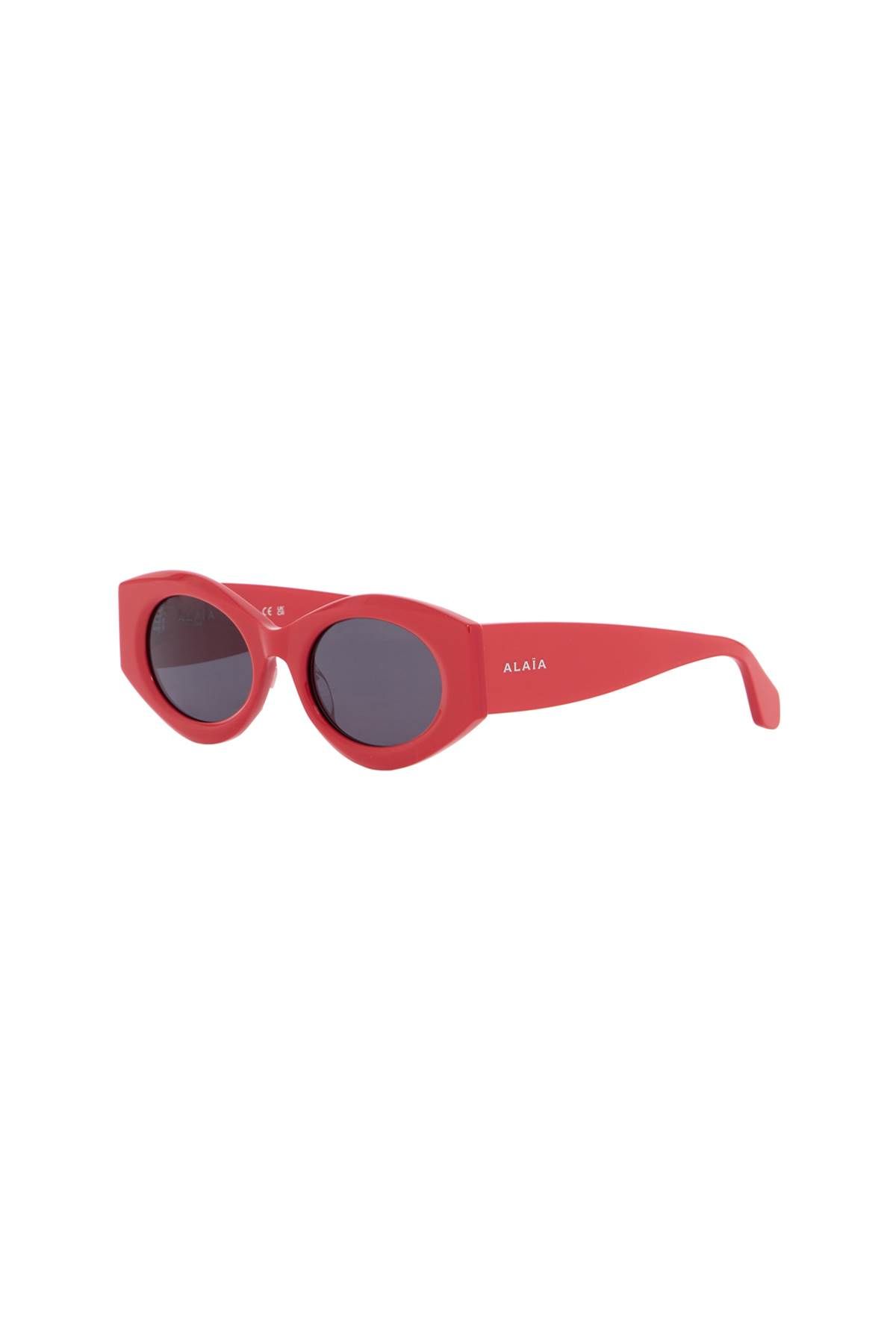 Shop Alaïa Oval Sunglasses For Stylish Sun In Red