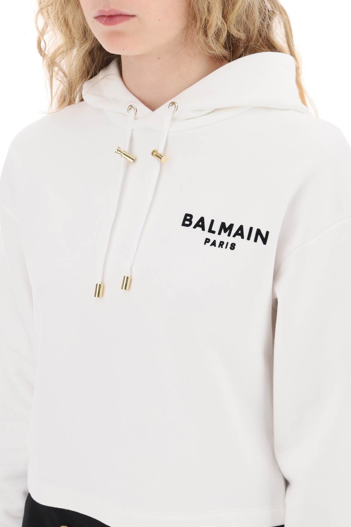 Shop Balmain Cropped Hoodie With Flocked Logo In White