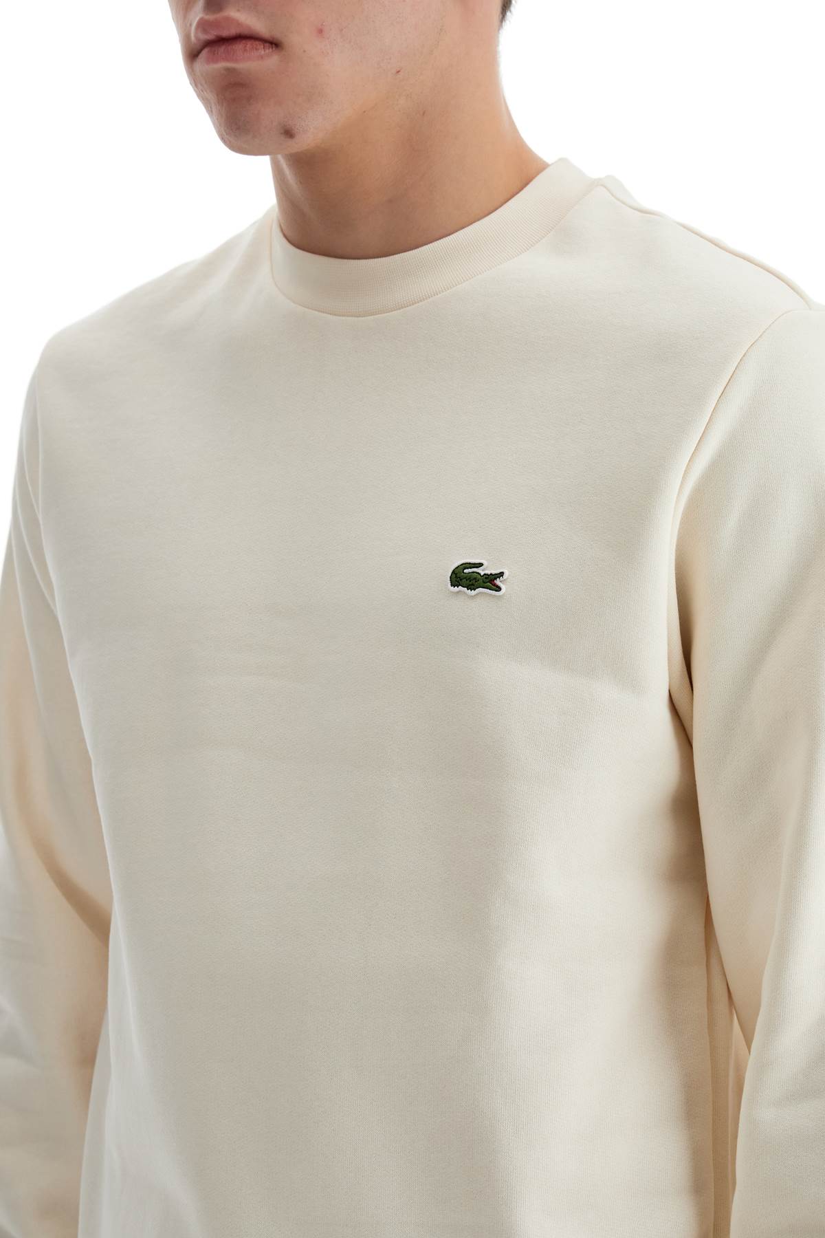 Shop Lacoste Classic Fit Crewneck Sweatshirt In White