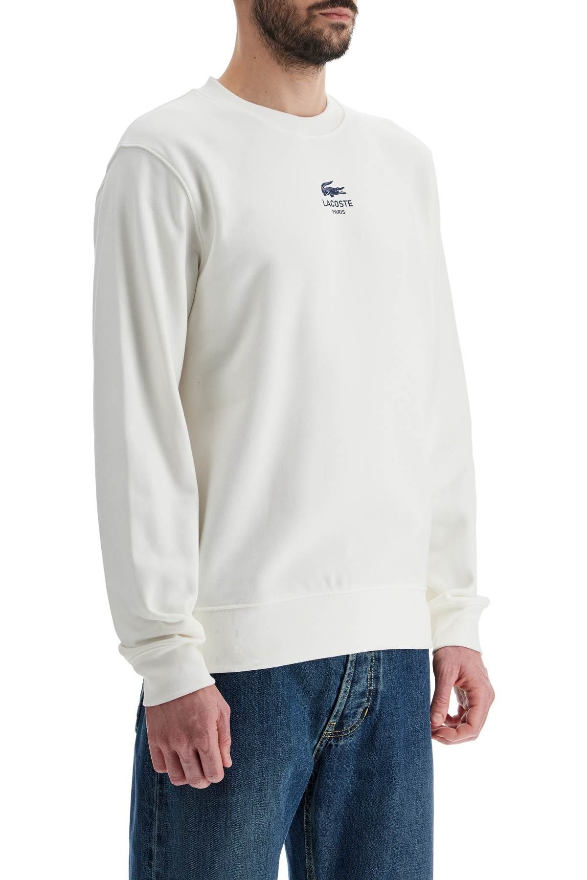 Shop Lacoste Classic Fit Crewneck Sweatshirt In White