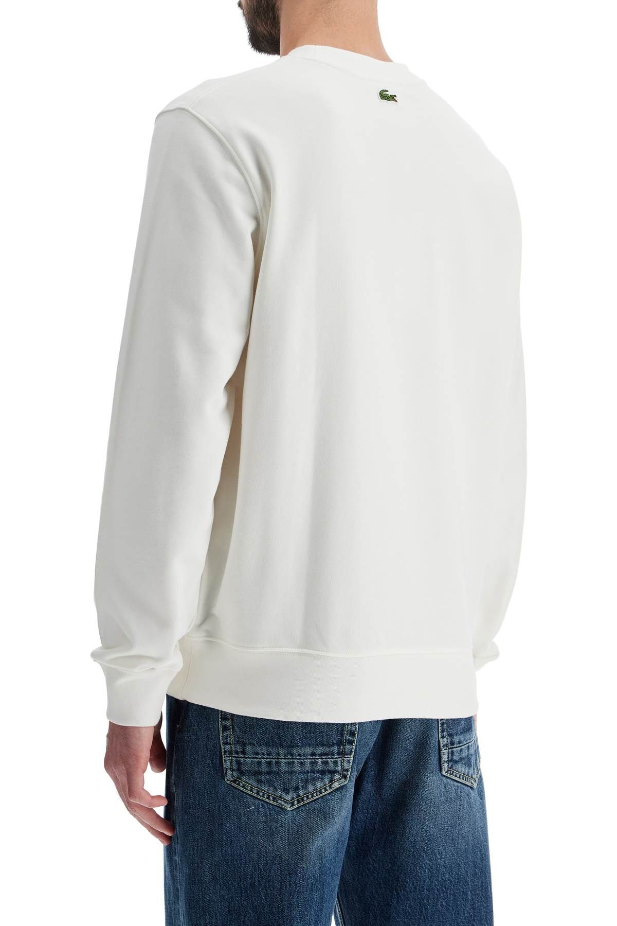 Shop Lacoste Classic Fit Crewneck Sweatshirt In White