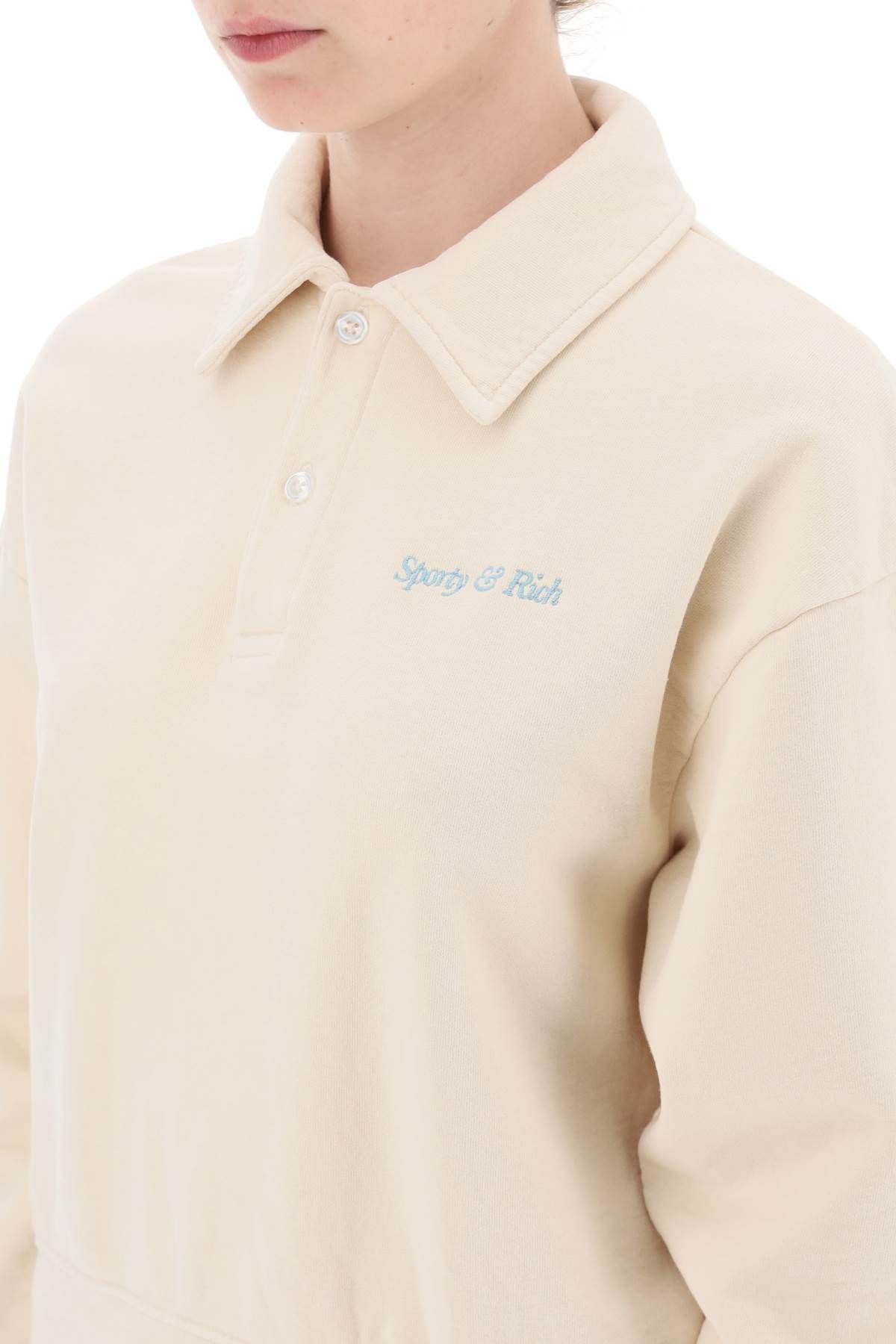 Shop Sporty And Rich Cropped Polo Sweatshirt In Beige