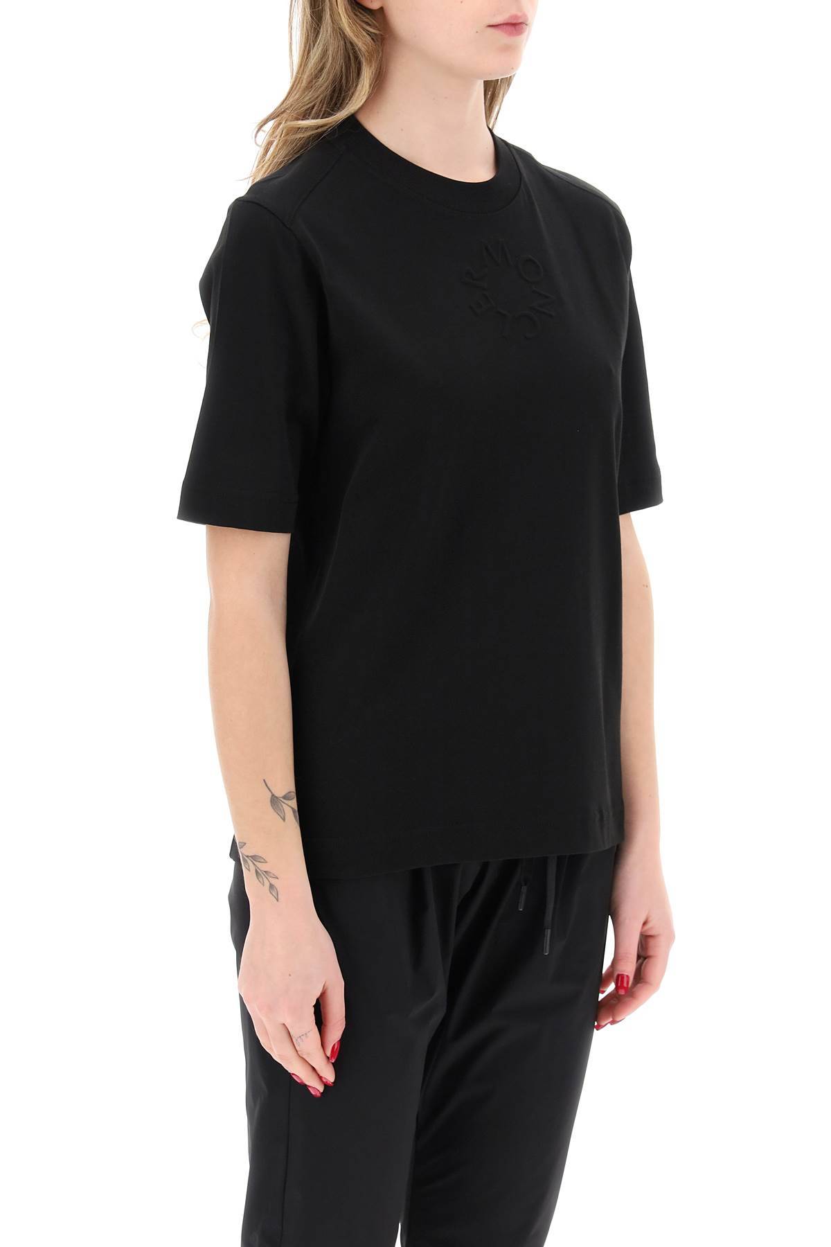 Shop Moncler Embossed Logo T-shirt In Black