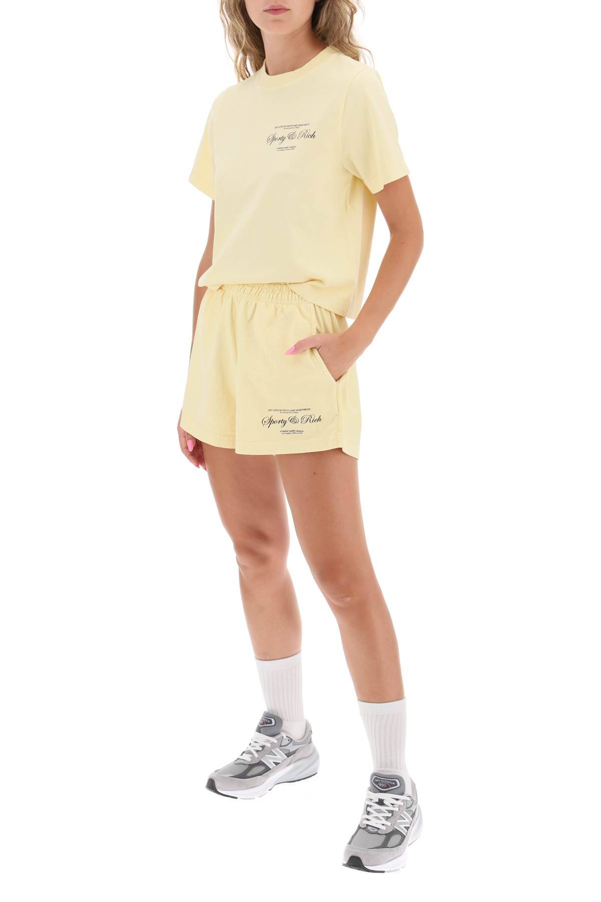 Shop Sporty And Rich Cropped T-shirt In Yellow
