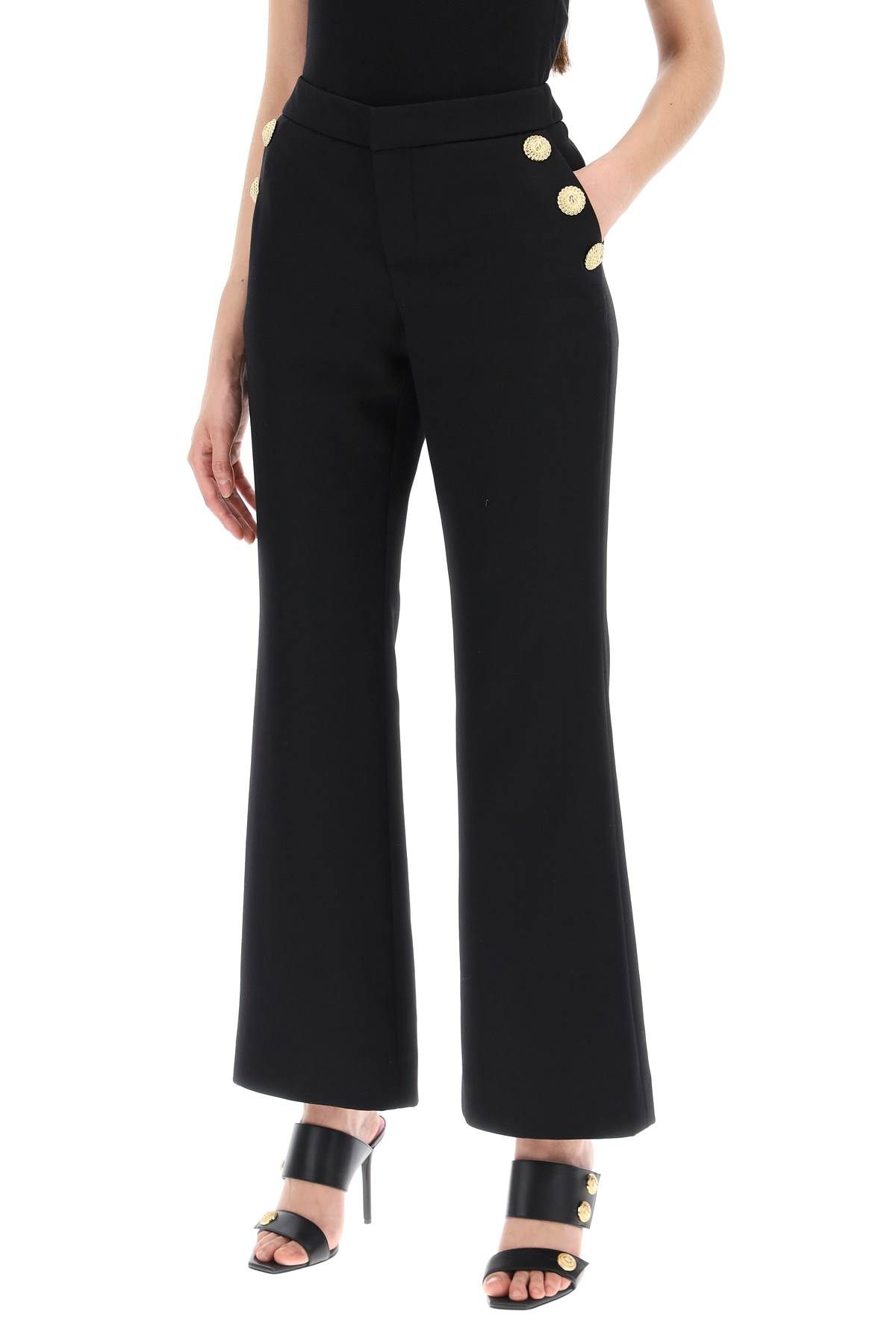 Shop Balmain Flared Pants With Embossed Buttons In Black