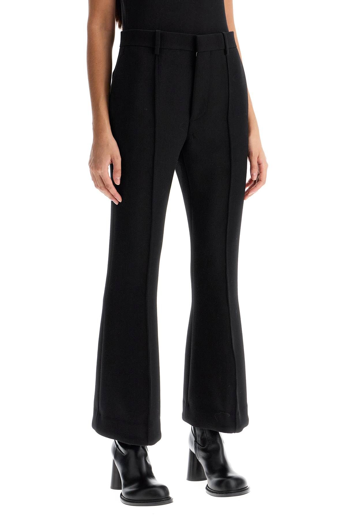 Shop Bottega Veneta Flared Wool Crepe Trousers In Black