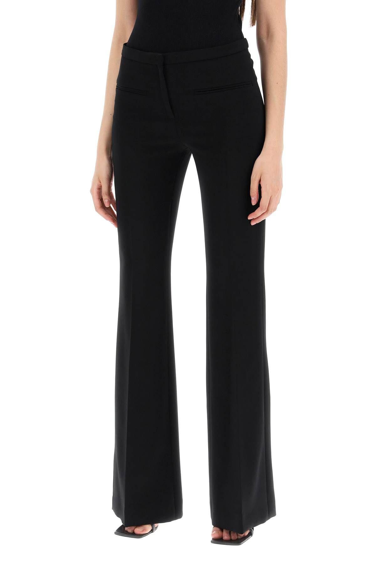 Shop Courrèges Tailored Bootcut Pants In Technical Jersey In Black