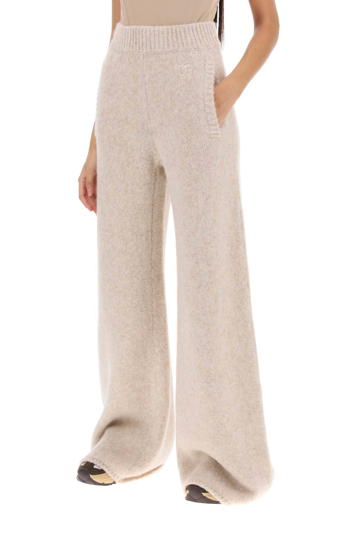 Shop Dolce & Gabbana Llama Knit Flared Pants In Beige