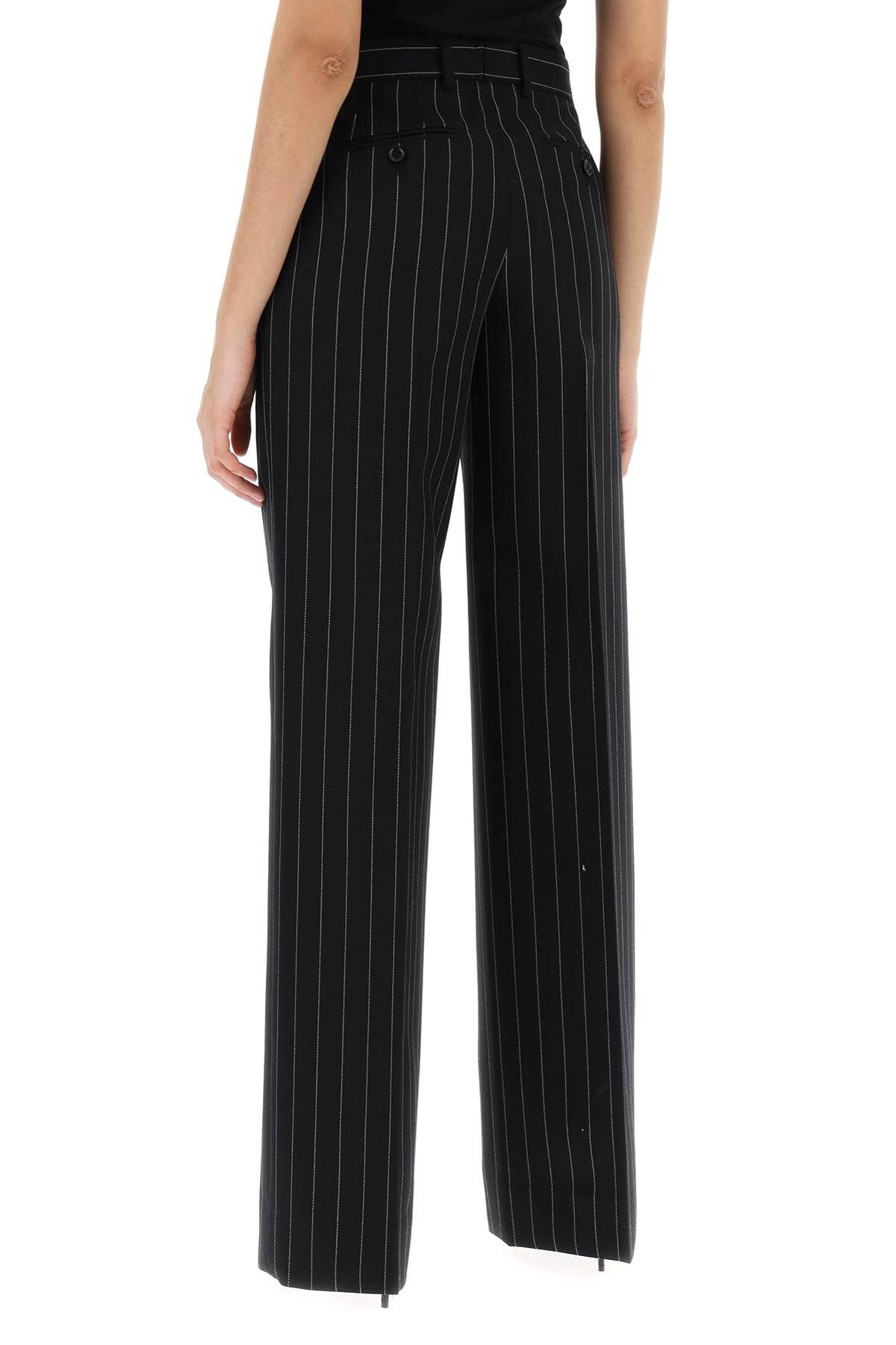 Shop Dolce & Gabbana Striped Flare Leg Pants In Black