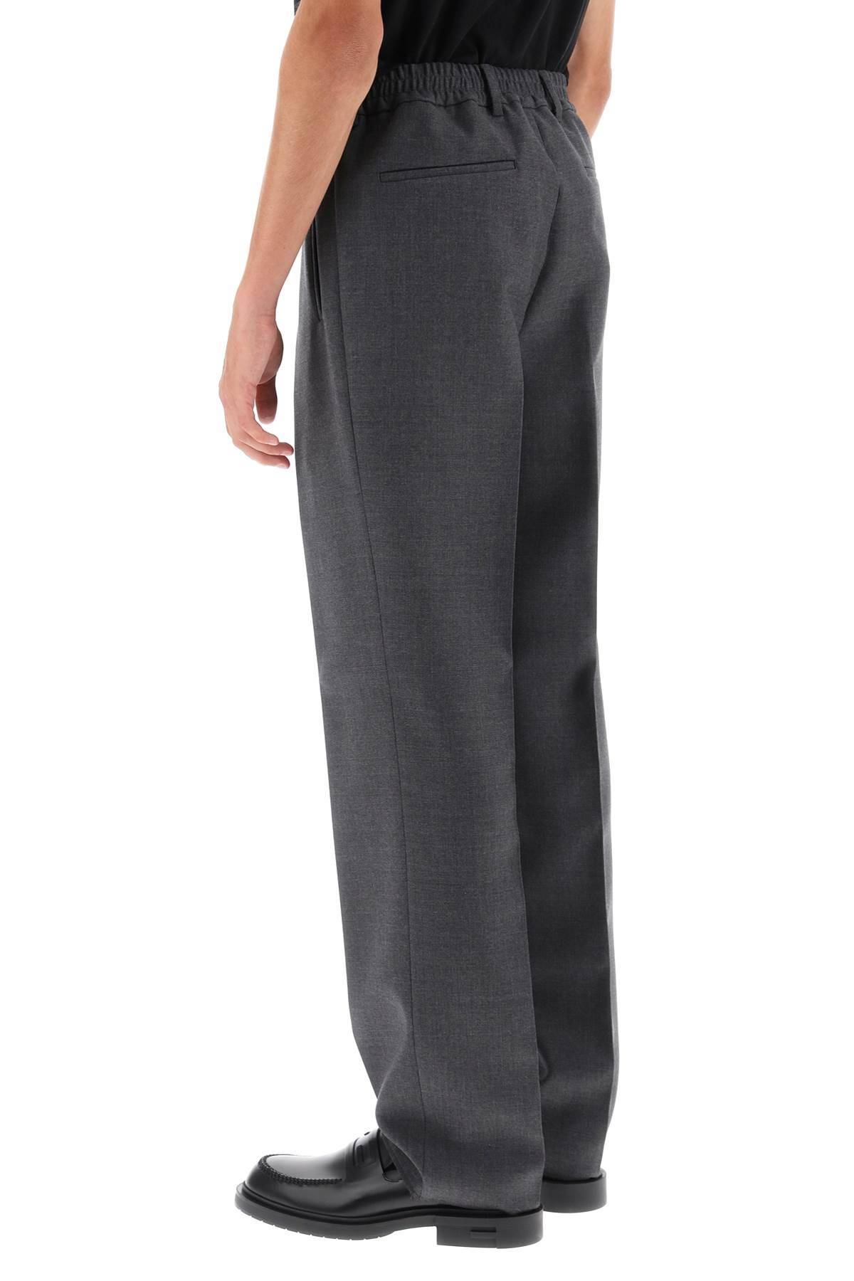 Shop Fendi Single Pleat Merino Wool Trousers In Grey