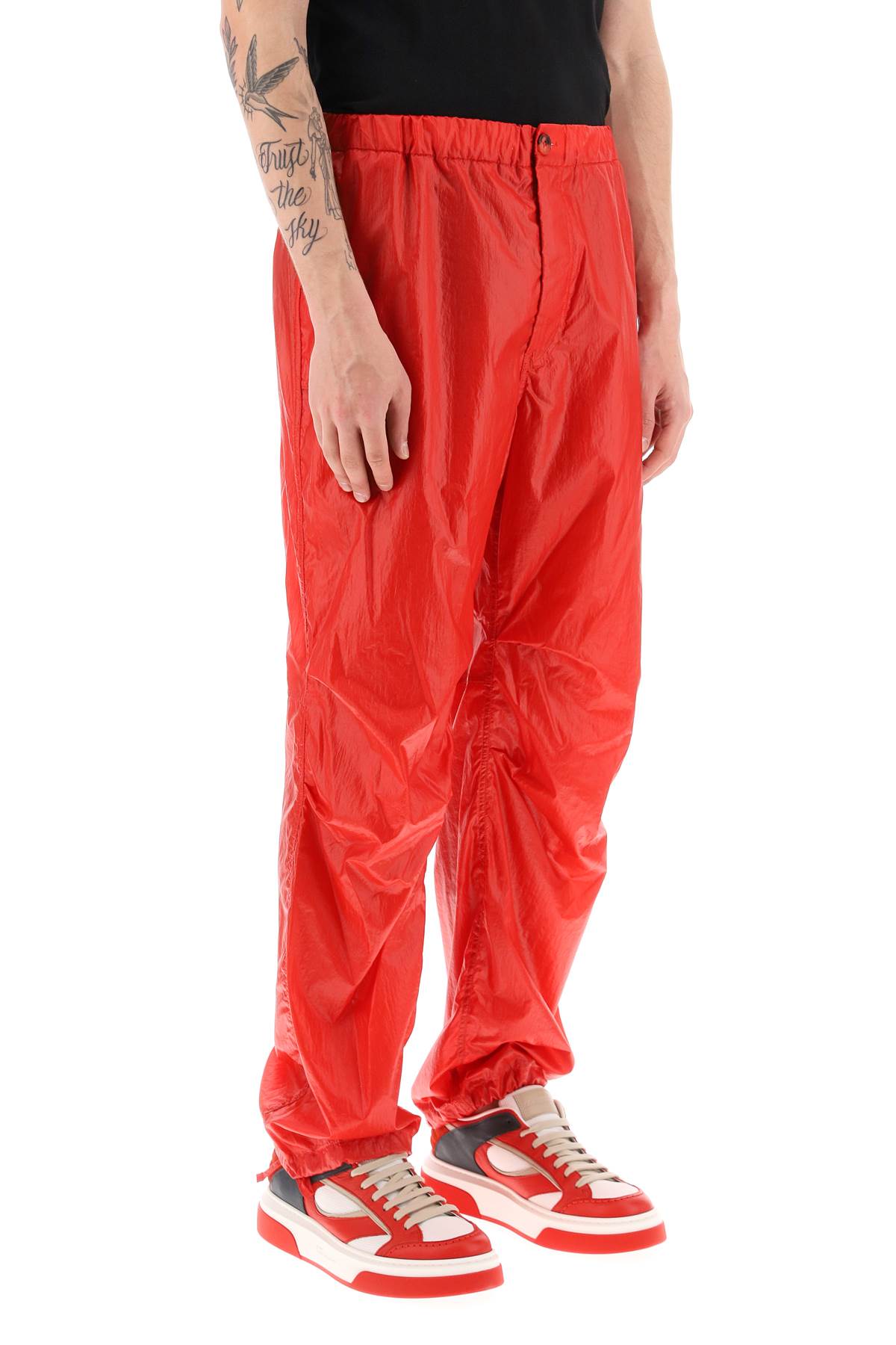Shop Ferragamo Lightweight Nylon Pants In Red
