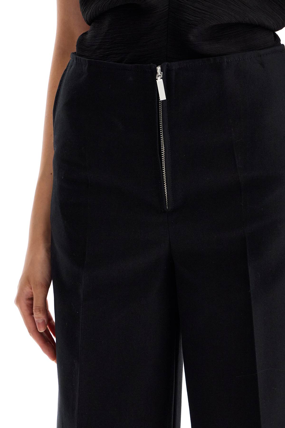 Shop Totême Zip-front Wide Trousers In Black