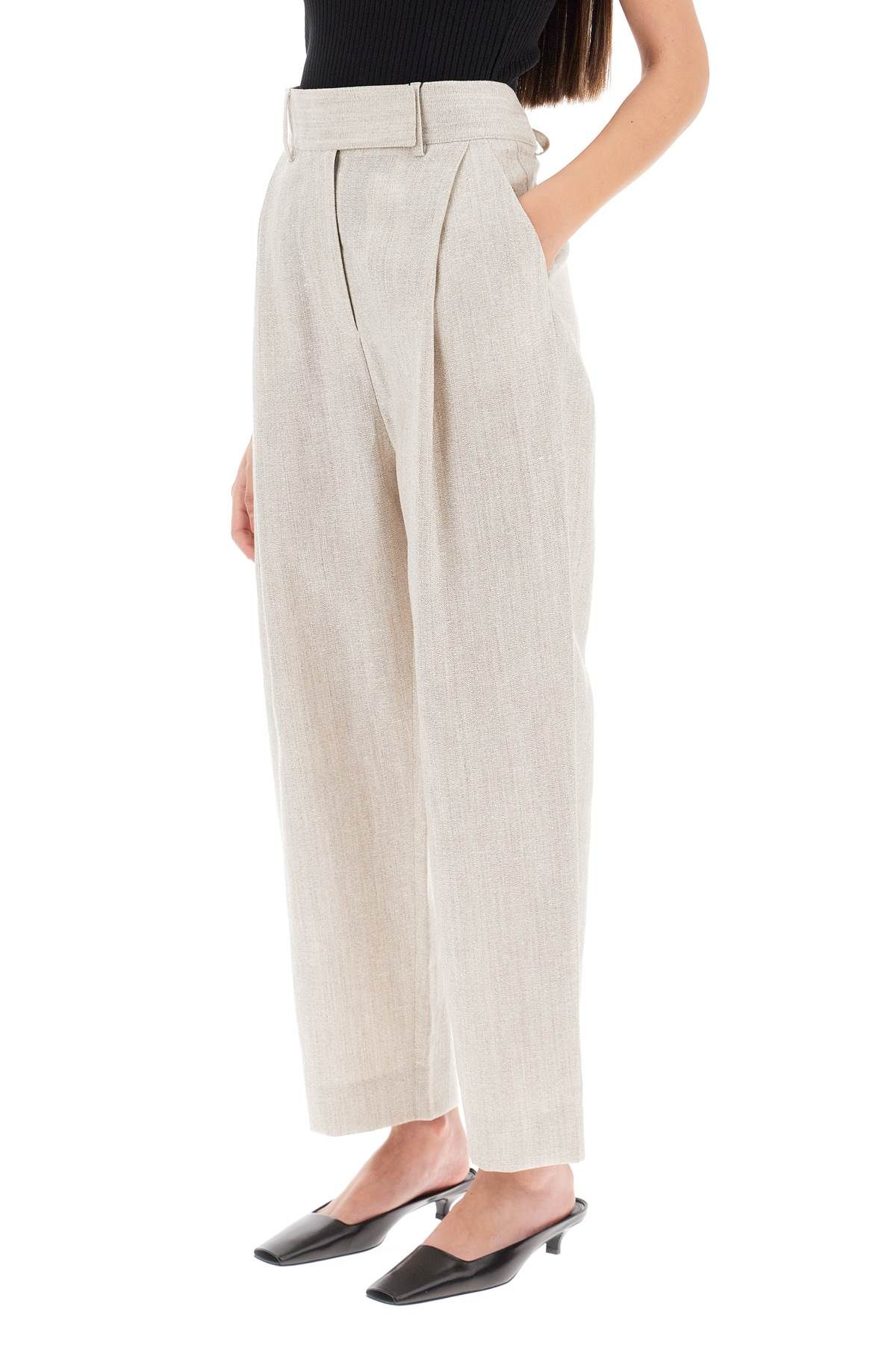Shop Totême Tapered Pants With Mélange Finish In Beige