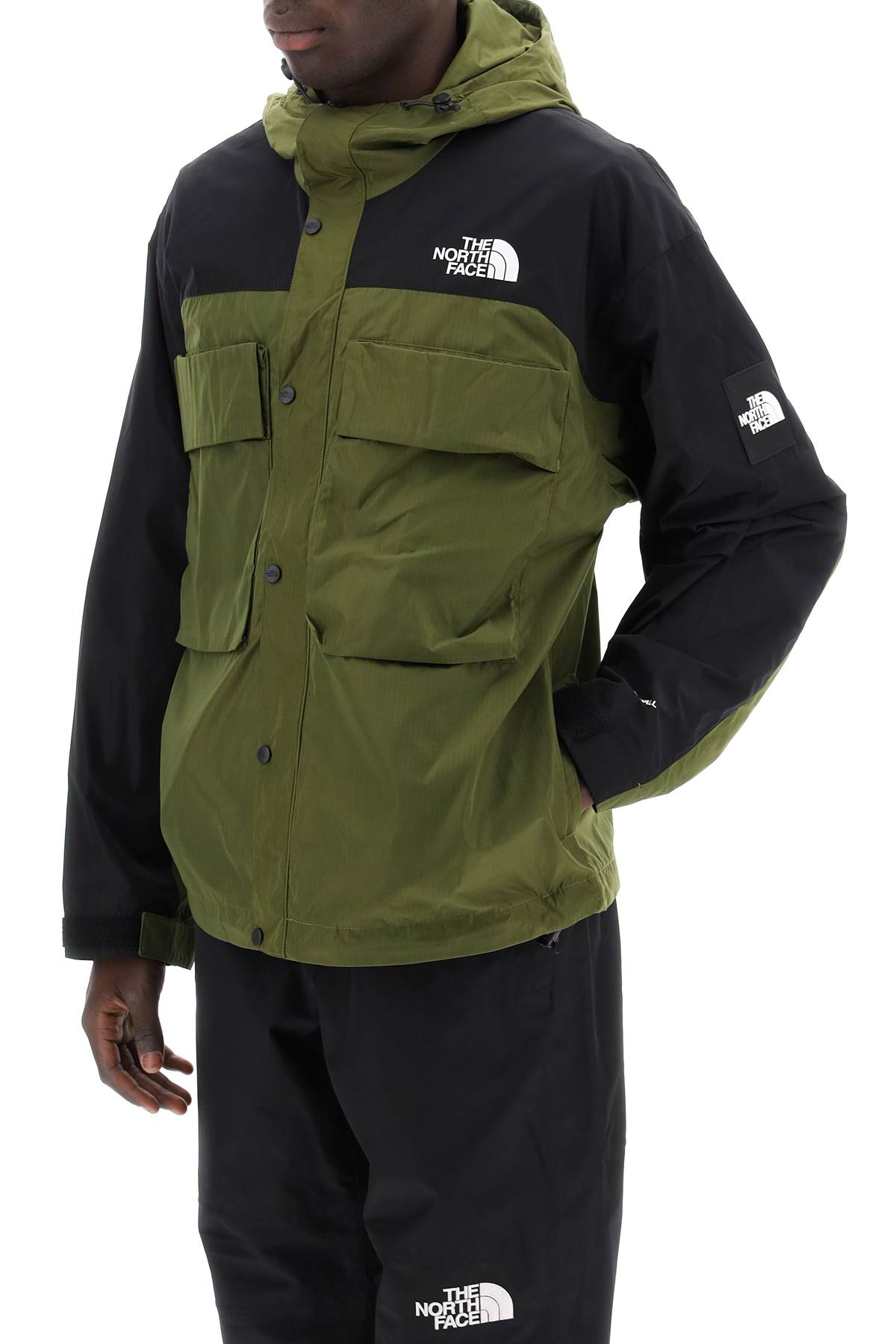Shop The North Face Tustin Windbreaker With Cargo Pockets In Green